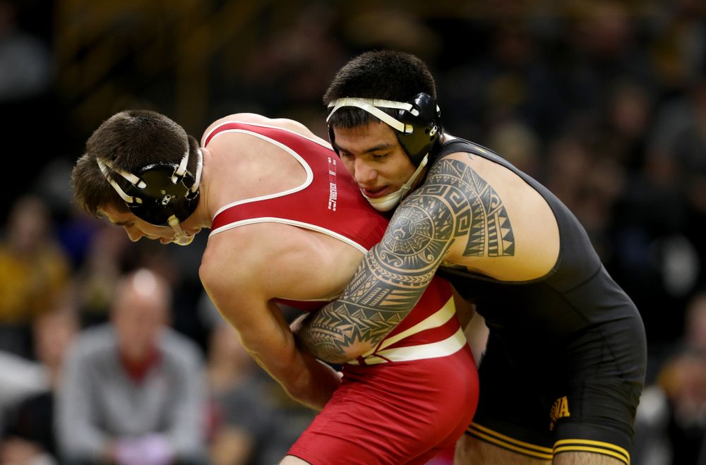 IowaÕs Pat Lugo wrestles WisconsinÕs Cole Martin at 149 pounds Sunday, December 1, 2019 at Carver-Hawkeye Arena. Lugo won the match 5-3. (Brian Ray/hawkeyesports.com)