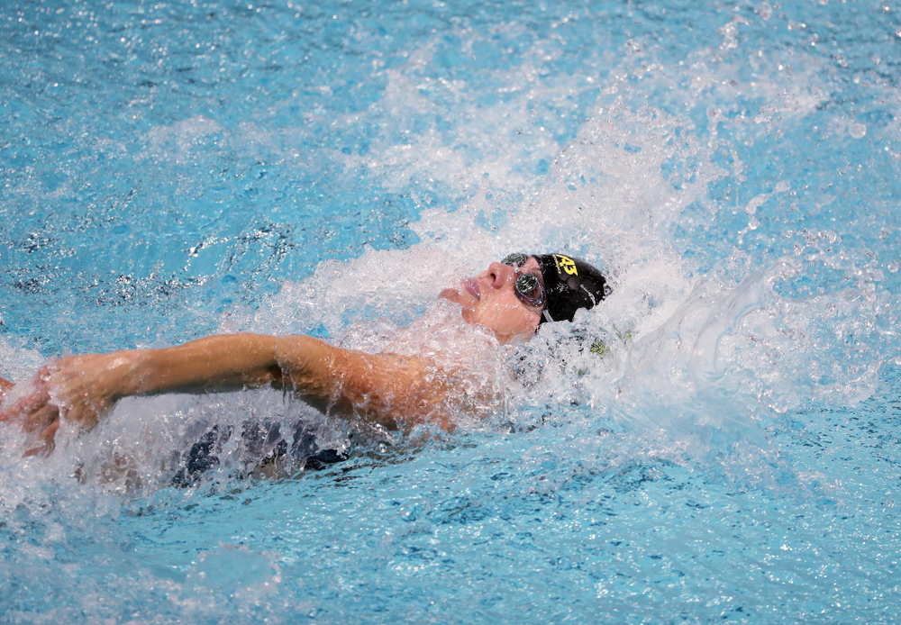IowaÕs Kennedy Gilbertson swims the backstroke leg of the 200 Medley Relay against Notre Dame and Illinois Saturday, January 11, 2020 at the Campus Recreation and Wellness Center. (Brian Ray/hawkeyesports.com)