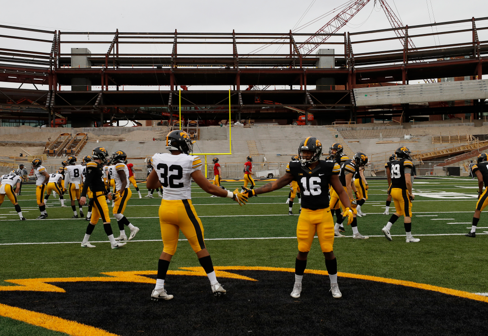 Iowa Hawkeyes defensive back Djimon Colbert (32) and running back Kyshaun Bryan (16)during the final spring practice Friday, April 20, 2018 at Kinnick Stadium. (Brian Ray/hawkeyesports.com)