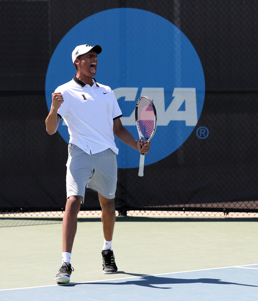 IowaÕs Oliver Okonkwo and Will Davies play a doubles match against the Michigan Wolverines Sunday, April 21, 2019 at the Hawkeye Tennis and Recreation Complex. (Brian Ray/hawkeyesports.com)