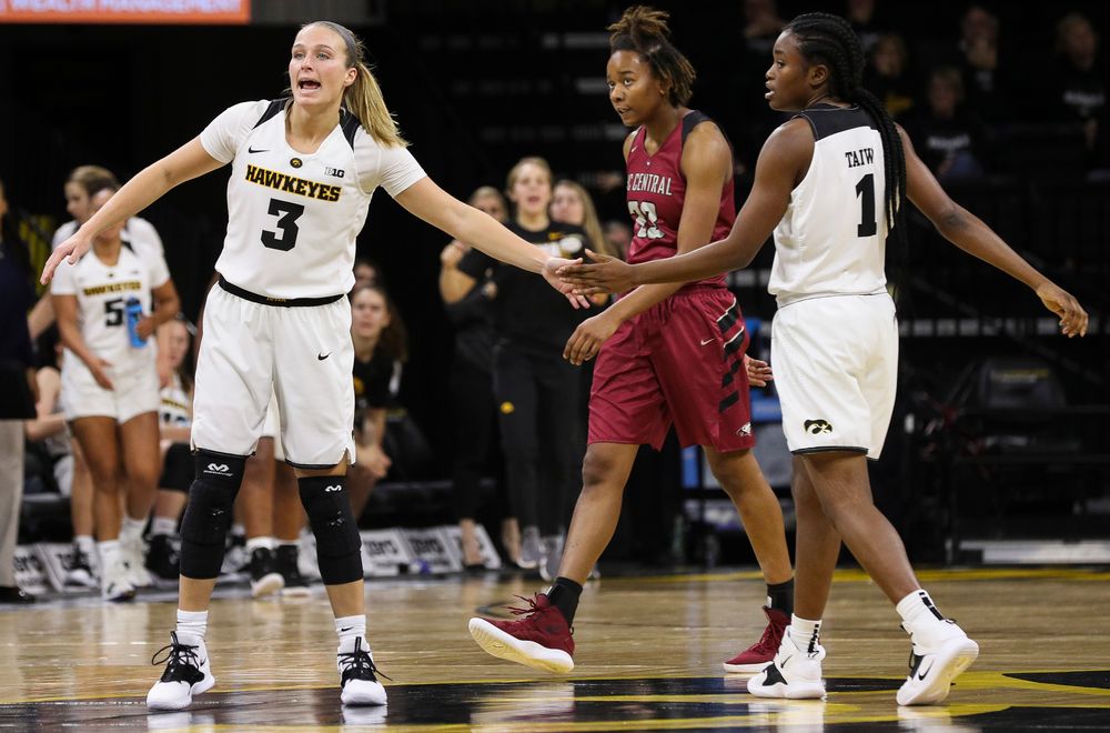 Iowa Hawkeyes guard Makenzie Meyer (3) high fives Iowa Hawkeyes guard Tomi Taiwo (1) after a made basket during a game against North Carolina Central at Carver-Hawkeye Arena on November 17, 2018. (Tork Mason/hawkeyesports.com)