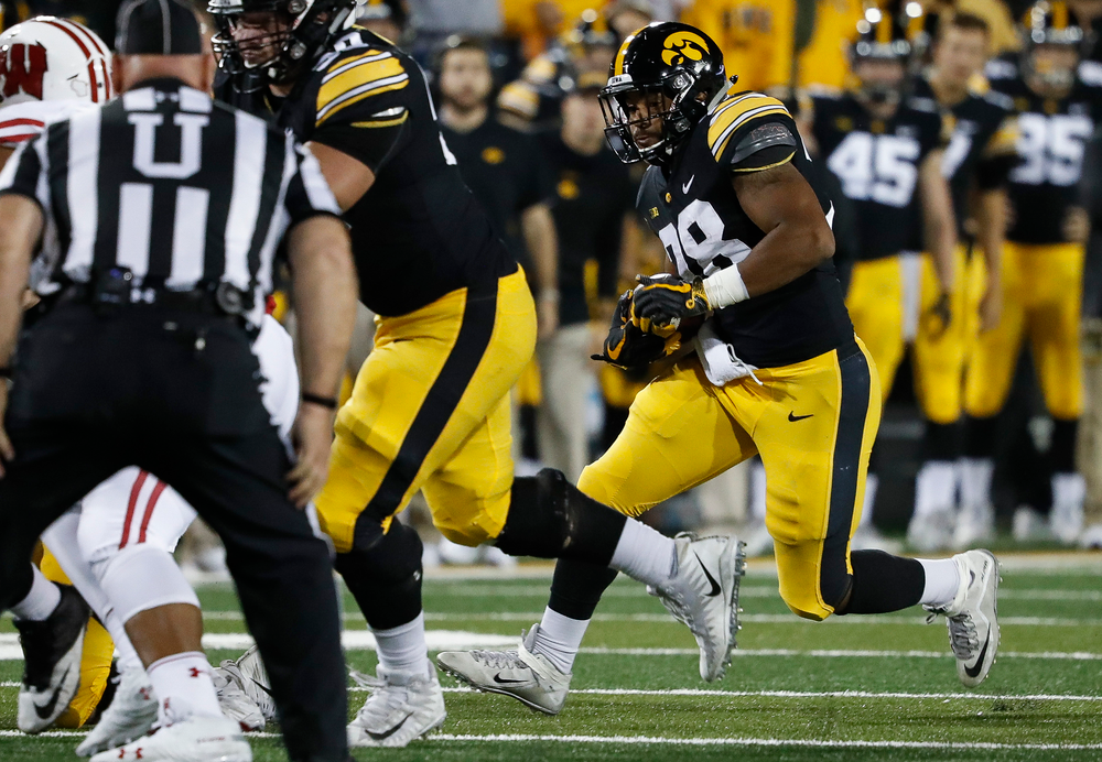 Iowa Hawkeyes running back Toren Young (28) runs the ball during a game against Wisconsin at Kinnick Stadium on September 22, 2018. (Tork Mason/hawkeyesports.com)