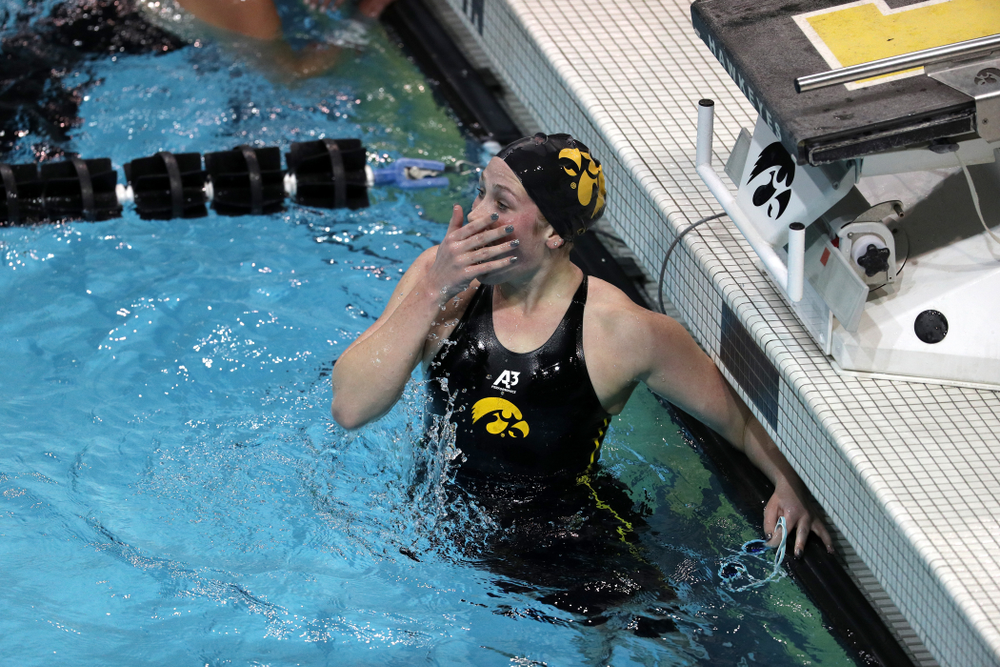Iowa's Abby Schneider reacts to her time the 1000-yard freestyle against the Iowa State Cyclones in the Iowa Corn Cy-Hawk Series Friday, December 7, 2018 at at the Campus Recreation and Wellness Center. (Brian Ray/hawkeyesports.com)