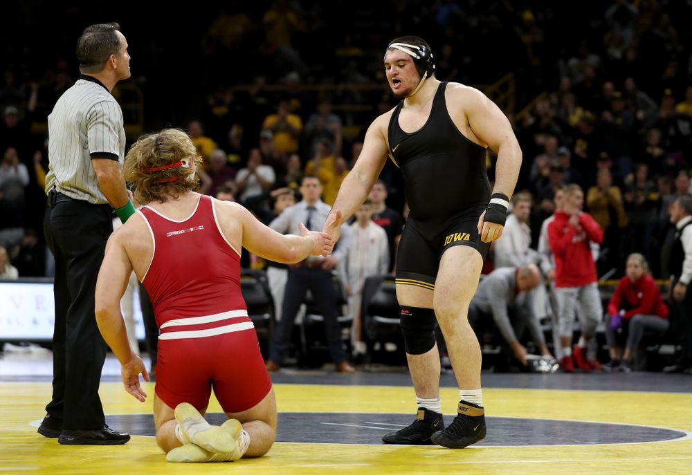 IowaÕs Tony Cassioppi wrestles WisconsinÕs Trent Hillger at heavyweight Sunday, December 1, 2019 at Carver-Hawkeye Arena. Cassioppi won the match 3-2. (Brian Ray/hawkeyesports.com)