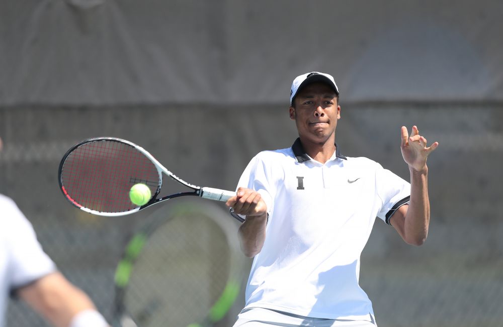 IowaÕs Oliver Okonkwo and Will Davies play a doubles match against the Michigan Wolverines Sunday, April 21, 2019 at the Hawkeye Tennis and Recreation Complex. (Brian Ray/hawkeyesports.com)
