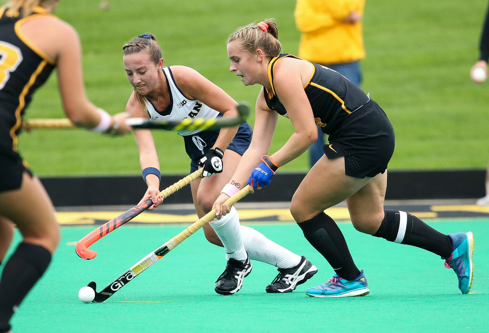 Iowa Hawkeyes midfielder Katie Birch (11) dribbles during a game against Michigan at Grant Field on October 5, 2018. (Tork Mason/hawkeyesports.com)