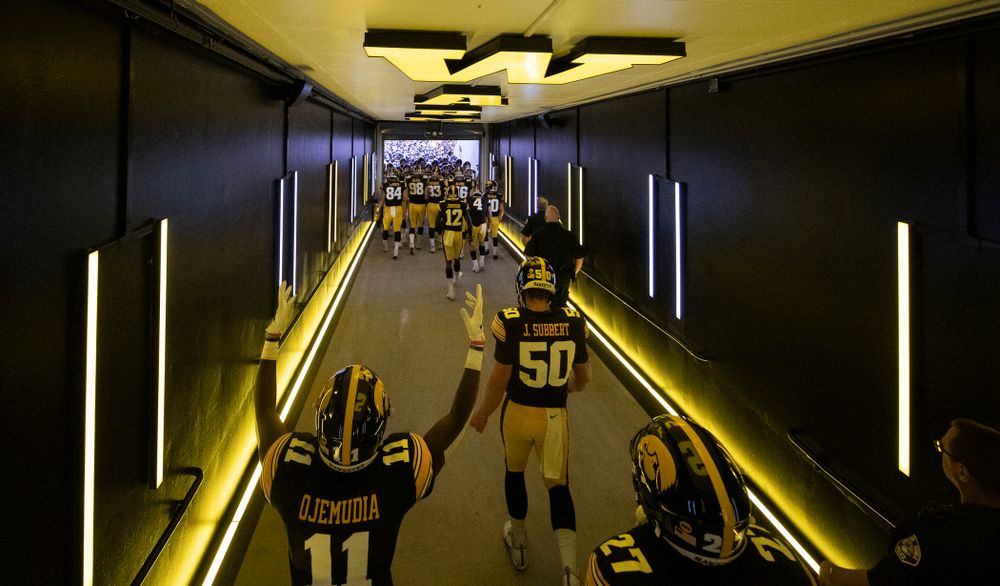 The Iowa Hawkeyes take the field in their new home tunnel before their game against the Miami RedHawks Saturday, August 31, 2019 at Kinnick Stadium in Iowa City. (Brian Ray/hawkeyesports.com)