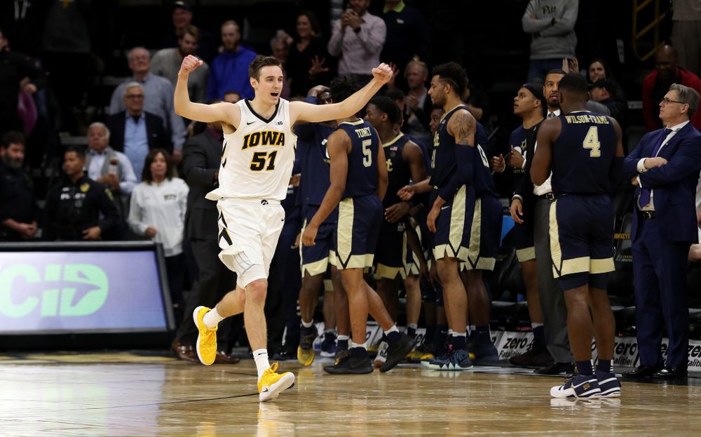 Iowa Hawkeyes forward Nicholas Baer (51) celebrates their victory against the Pitt Panthers Tuesday, November 27, 2018 at Carver-Hawkeye Arena. (Brian Ray/hawkeyesports.com)