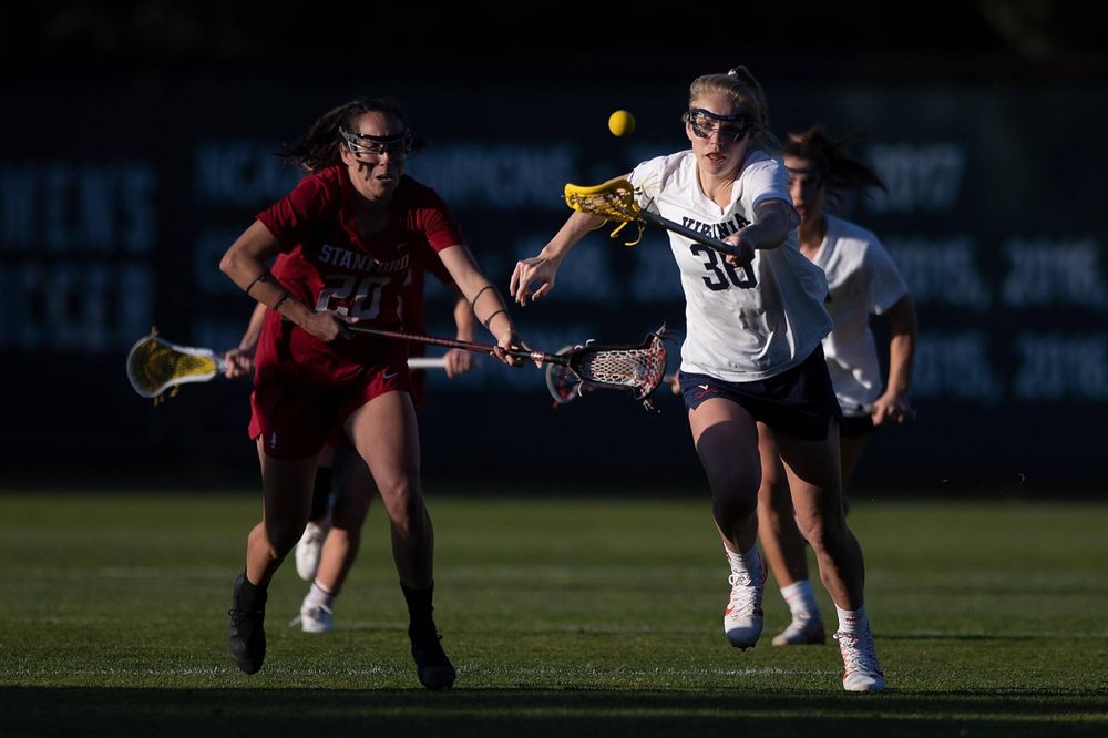 STANFORD, California - FEBRUARY 14: Virginia Cavaliers midfield Anna Hauser (36) reaches for the ball after a draw with Stanford Cardinal midfield Genesis Lucero (20) during the second half at Cagan Stadium on February 14, 2020 in Stanford, California. The Virginia Cavaliers defeated the Stanford Cardinal 12-11. (Photo by Jason O. Watson)