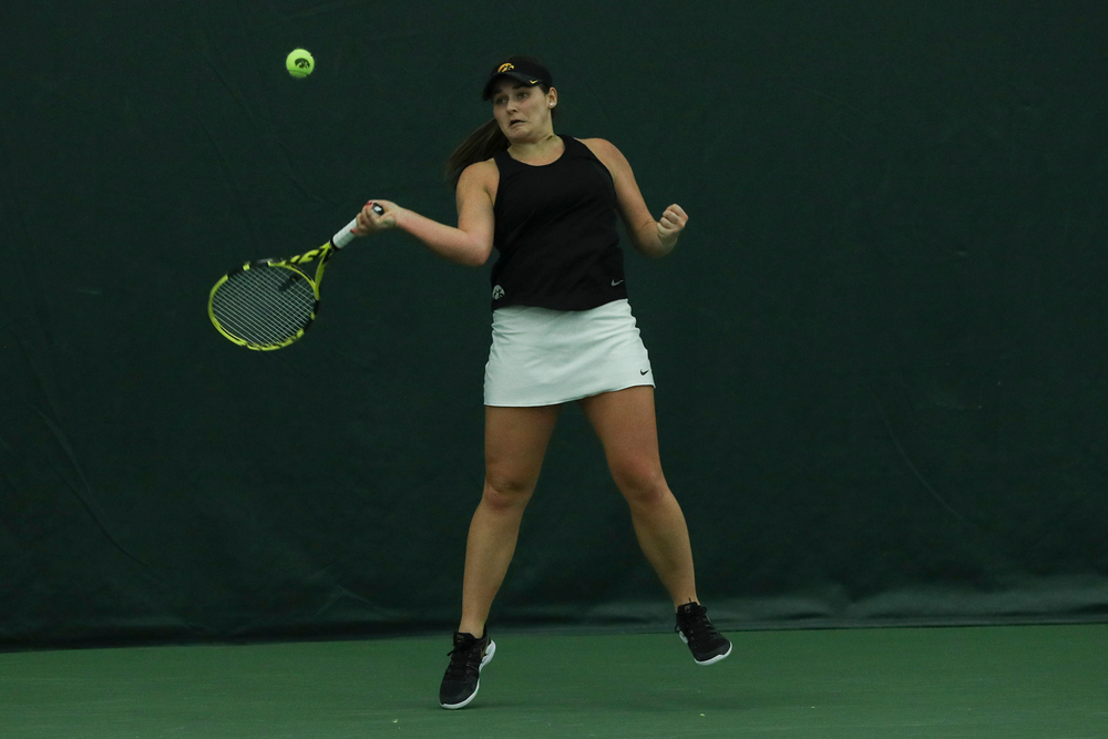 Iowa’s Danielle Bauers returns a hit during the Iowa women’s tennis meet vs DePaul on Friday, February 21, 2020 at the Hawkeye Tennis and Recreation Complex. (Lily Smith/hawkeyesports.com)