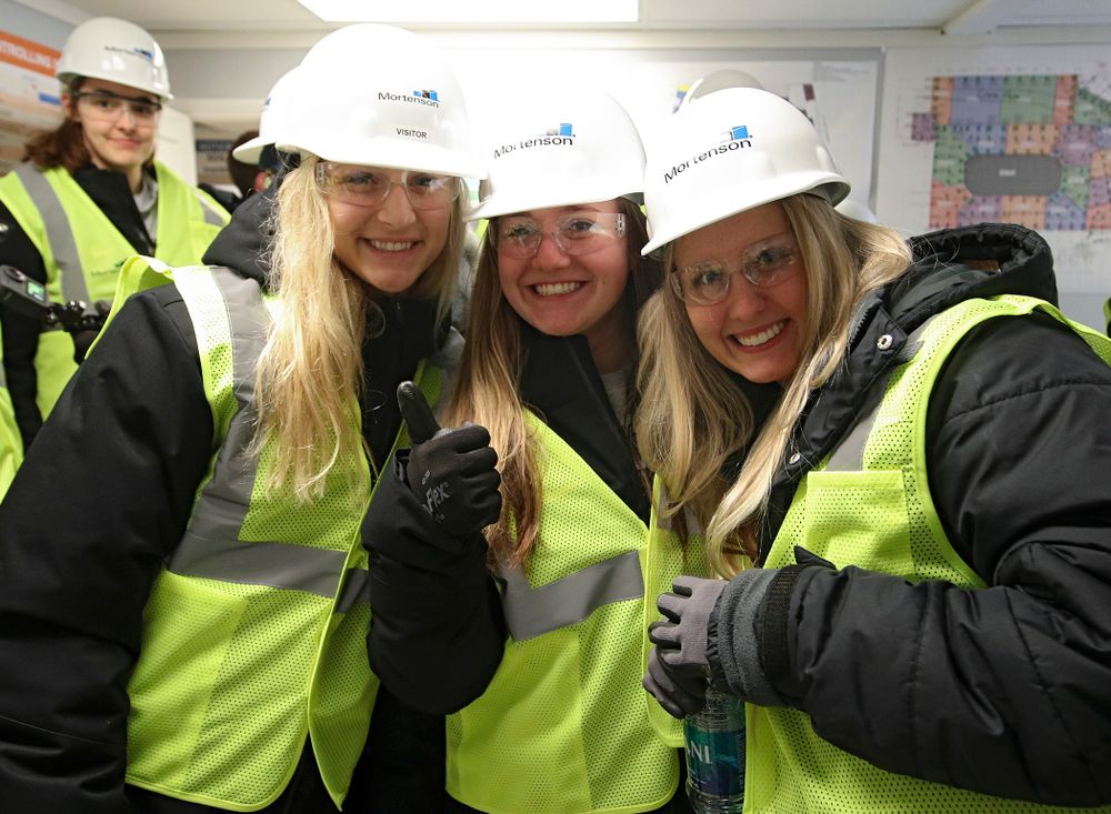 Iowa’s Kyndra Hansen (from left), Joslyn Boyer, and Maddie Slagle pose for a photo in their personal protective equipment as the Iowa Volleyball team and staff prepares to take a construction tour of Xtream Arena in Coralville on Thursday, January 30, 2020. (Stephen Mally/hawkeyesports.com)