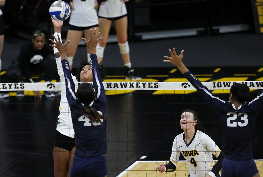 Iowa Hawkeyes middle blocker Amiya Jones (9) spikes the ball during a match against Penn State at Carver-Hawkeye Arena on November 3, 2018. (Tork Mason/hawkeyesports.com)