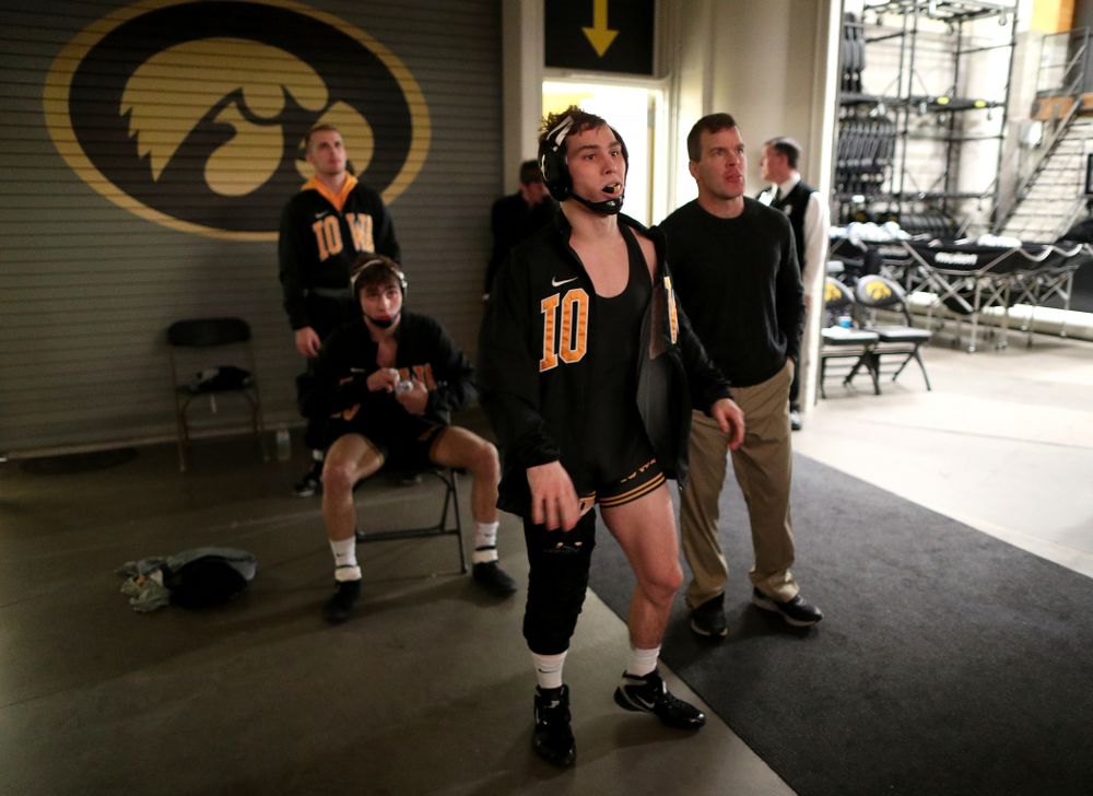 IowaÕs Spencer Lee prepares to wrestle WisconsinÕs Michael Cullen at 125 pounds Sunday, December 1, 2019 at Carver-Hawkeye Arena. Lee won the match with a 16-0 technical fall. (Brian Ray/hawkeyesports.com)