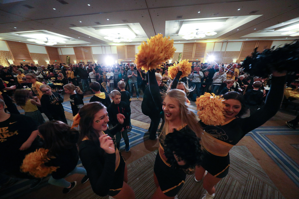 Fans dance to the Hokey Pokey in honor of the late Hayden Fry during the Holiday Bowl Hawkeye Huddle Thursday, December 26, 2019 at the Hilton in downtown San Diego. (Brian Ray/hawkeyesports.com)
