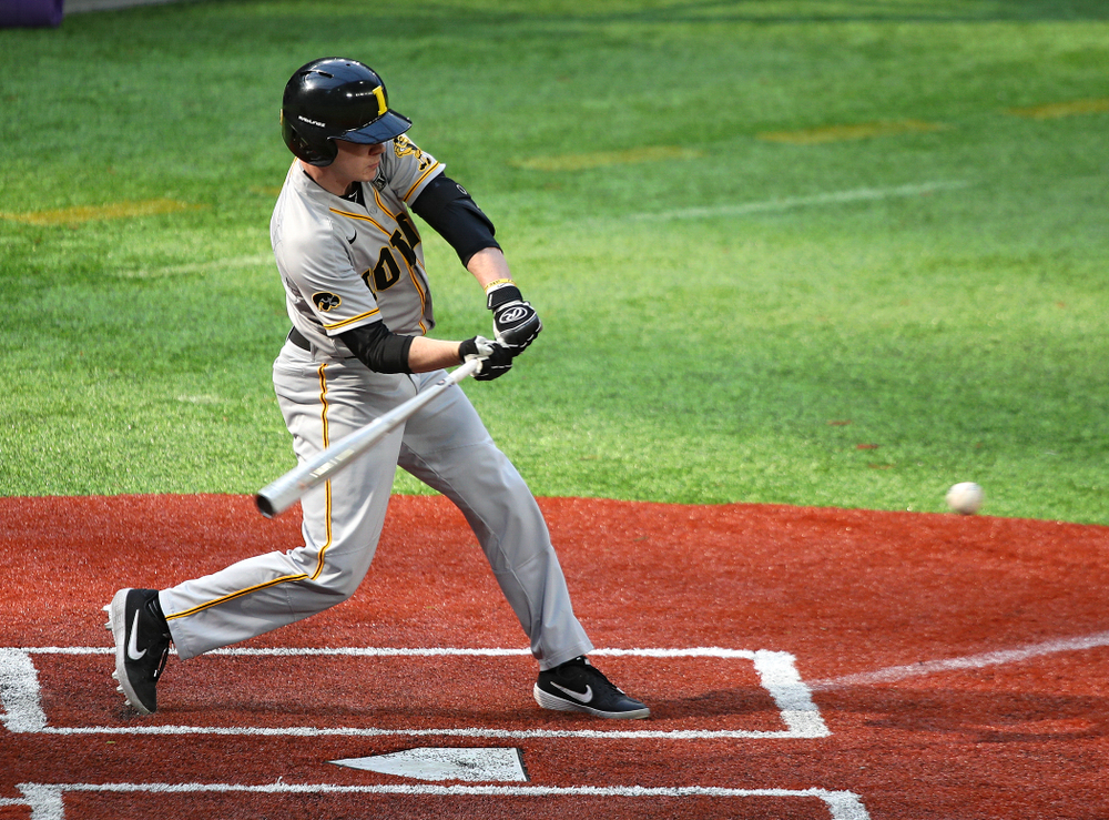 Iowa Hawkeyes utility player Sam Link (3) drives a pitch and reaches on an error during the third inning of their CambriaCollegeClassic game at U.S. Bank Stadium in Minneapolis, Minn. on Friday, February 28, 2020. (Stephen Mally/hawkeyesports.com)