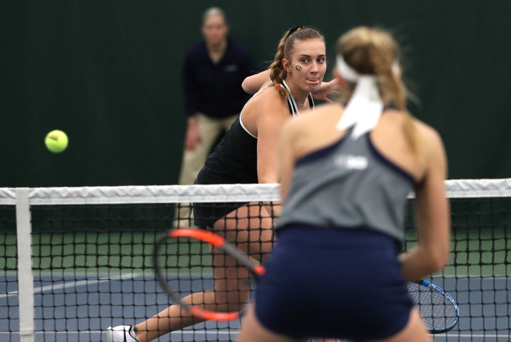 Iowa's Ashleigh Jacobs and Sophie Clark play a doubles match against the Penn State Nittany Lions Sunday, February 24, 2019 at the Hawkeye Tennis and Recreation Complex. (Brian Ray/hawkeyesports.com)