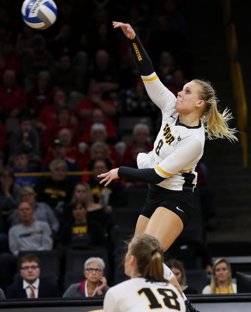 Iowa Hawkeyes right side hitter Reghan Coyle (8) spikes the ball during a match against Nebraska at Carver-Hawkeye Arena on November 7, 2018. (Tork Mason/hawkeyesports.com)
