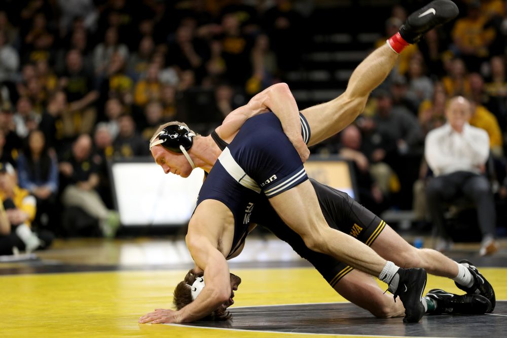 Iowa’s Kaleb Young wrestles Penn State’s Bo Pipher at 157 pounds Friday, January 31, 2020 at Carver-Hawkeye Arena. Young defeated Pipher 6-1. (Brian Ray/hawkeyesports.com)
