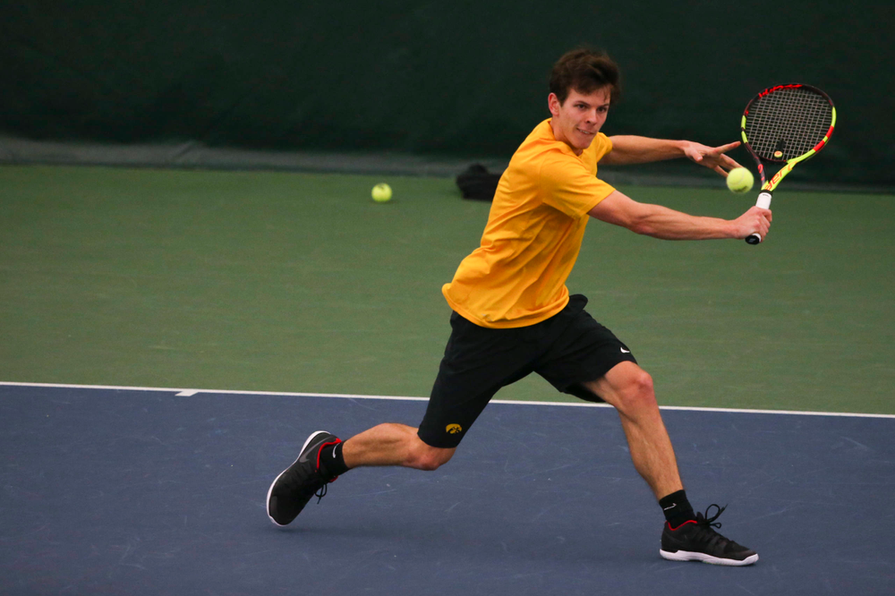 Iowa's Joe Tyler at a tennis match vs Drake Friday, March 8, 2019 at the Hawkeye Tennis and Recreation Complex. (Lily Smith/hawkeyesports.com)