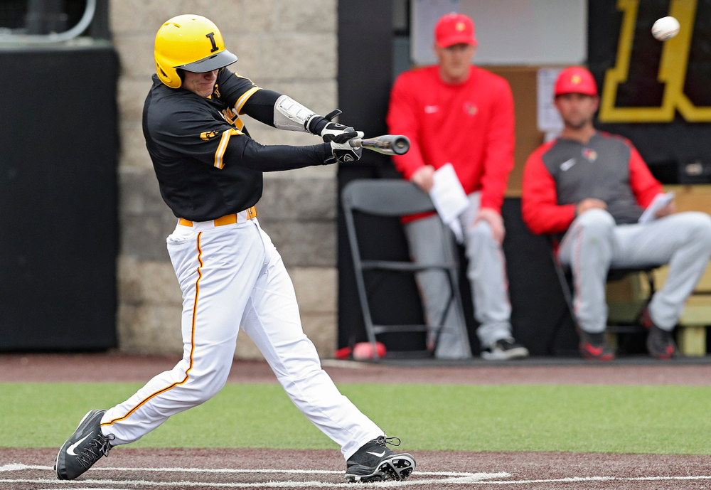 Iowa Hawkeyes catcher Austin Martin (34) hits an RBI double during the first inning of their game against Illinois State at Duane Banks Field in Iowa City on Wednesday, Apr. 3, 2019. (Stephen Mally/hawkeyesports.com)