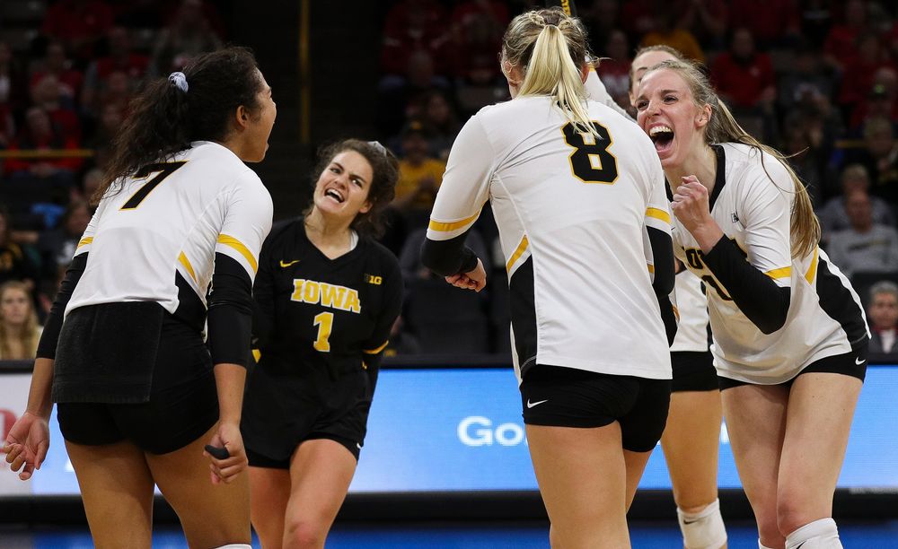 Iowa Hawkeyes middle blocker Hannah Clayton (18) celebrates after winning a point during a match against Nebraska at Carver-Hawkeye Arena on November 7, 2018. (Tork Mason/hawkeyesports.com)