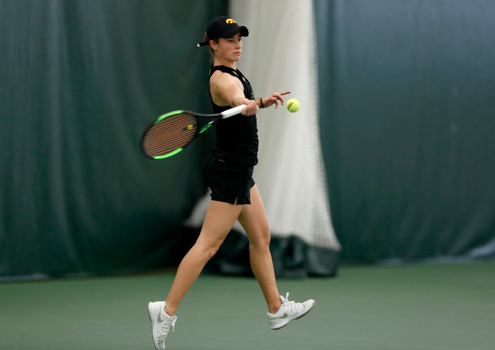Elise Van Heuvelen and Anastasia Reimchen play a doubles match against Ohio State Sunday, March 25, 2018 at the Hawkeye Tennis and Recreation Center. (Brian Ray/hawkeyesports.com)