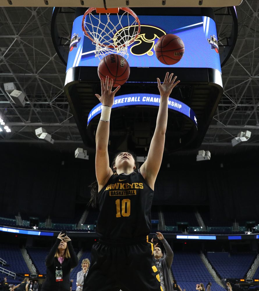 Iowa Hawkeyes forward Megan Gustafson (10) does the Mikan Drill the ESPN Crew following practice for their Sweet 16 matchup against NC State Friday, March 29, 2019 at the Greensboro Coliseum in Greensboro, NC.(Brian Ray/hawkeyesports.com)