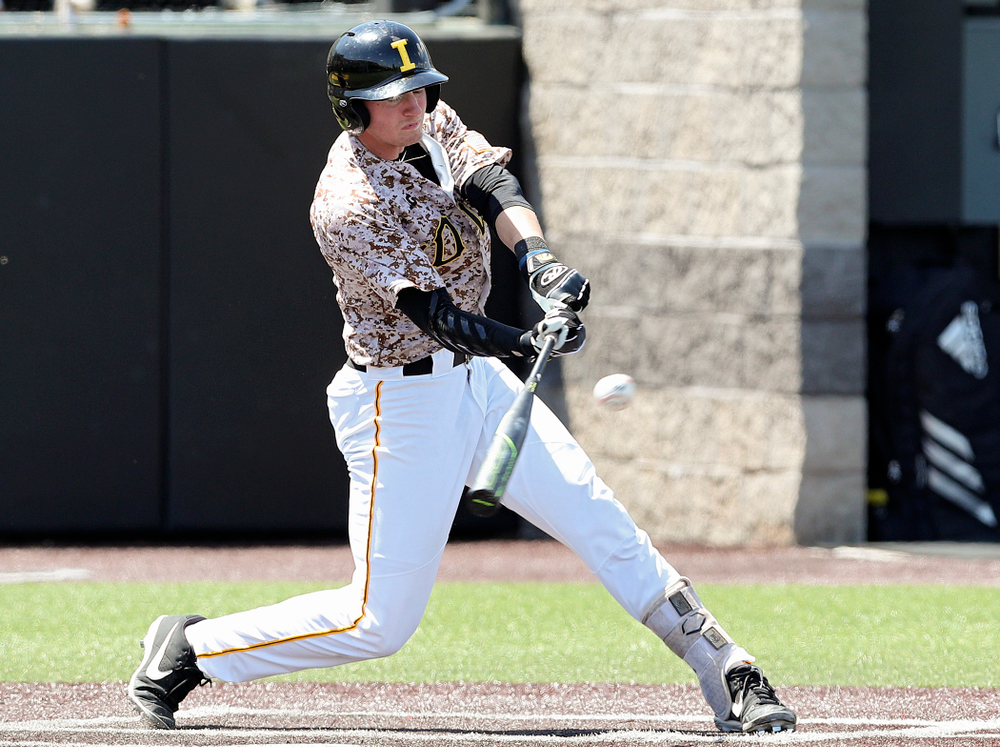 Iowa Hawkeyes second baseman Brendan Sher (2) drives a pitch for a hit during the second inning of their game against UC Irvine at Duane Banks Field in Iowa City on Sunday, May. 5, 2019. (Stephen Mally/hawkeyesports.com)