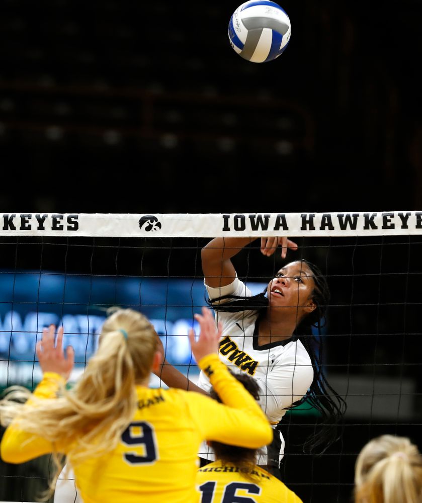 Iowa Hawkeyes middle blocker Amiya Jones (9) against the Michigan Wolverines Sunday, September 23, 2018 at Carver-Hawkeye Arena. (Brian Ray/hawkeyesports.com)