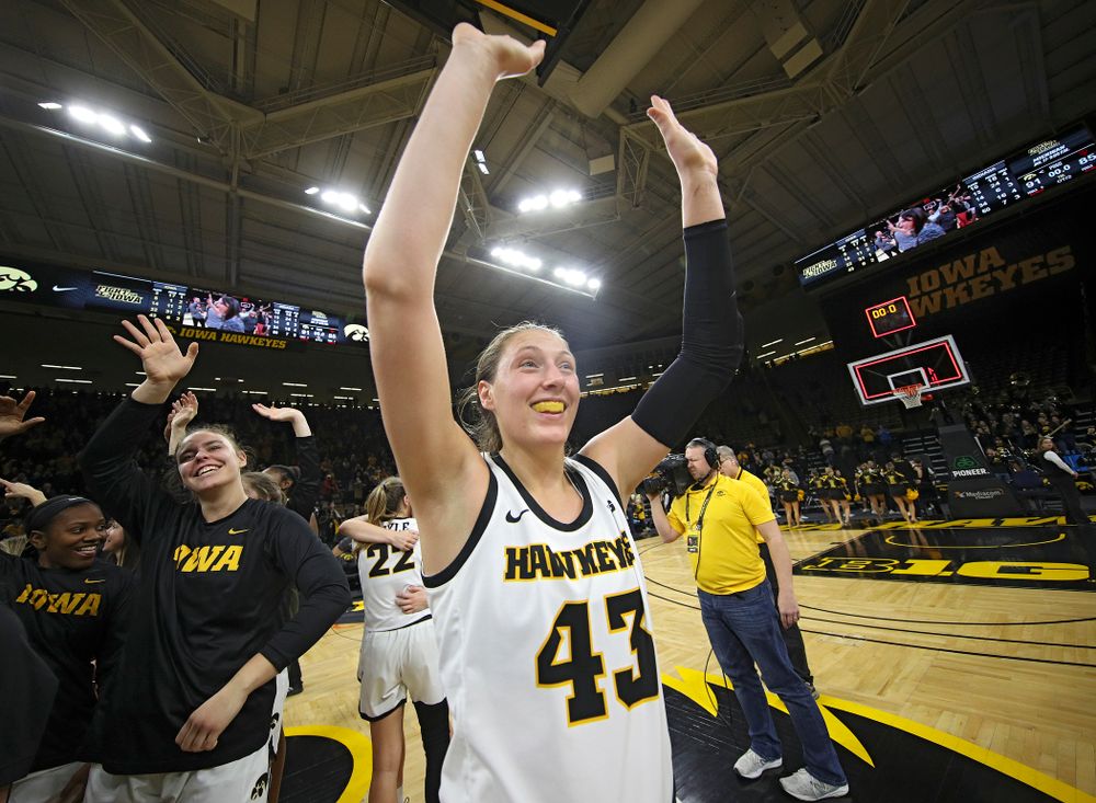 Iowa Hawkeyes forward Amanda Ollinger (43) waves to the crowd after their double overtime win at Carver-Hawkeye Arena in Iowa City on Sunday, January 12, 2020. (Stephen Mally/hawkeyesports.com)
