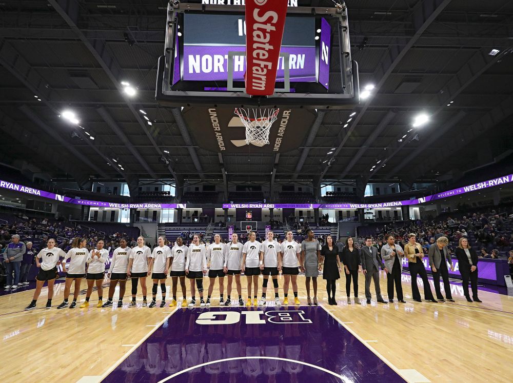 The Hawkeyes stand for the National Anthem before their game at Welsh-Ryan Arena in Evanston, Ill. on Sunday, January 5, 2020. (Stephen Mally/hawkeyesports.com)