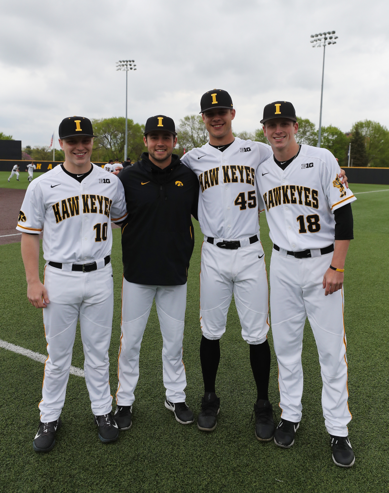 Iowa Hawkeyes Derek Lieurance (10), Grant Leonard (43), Kyle Shimp (45), and Shane Ritter (18) before their game against Michigan State Sunday, May 12, 2019 at Duane Banks Field. (Brian Ray/hawkeyesports.com)