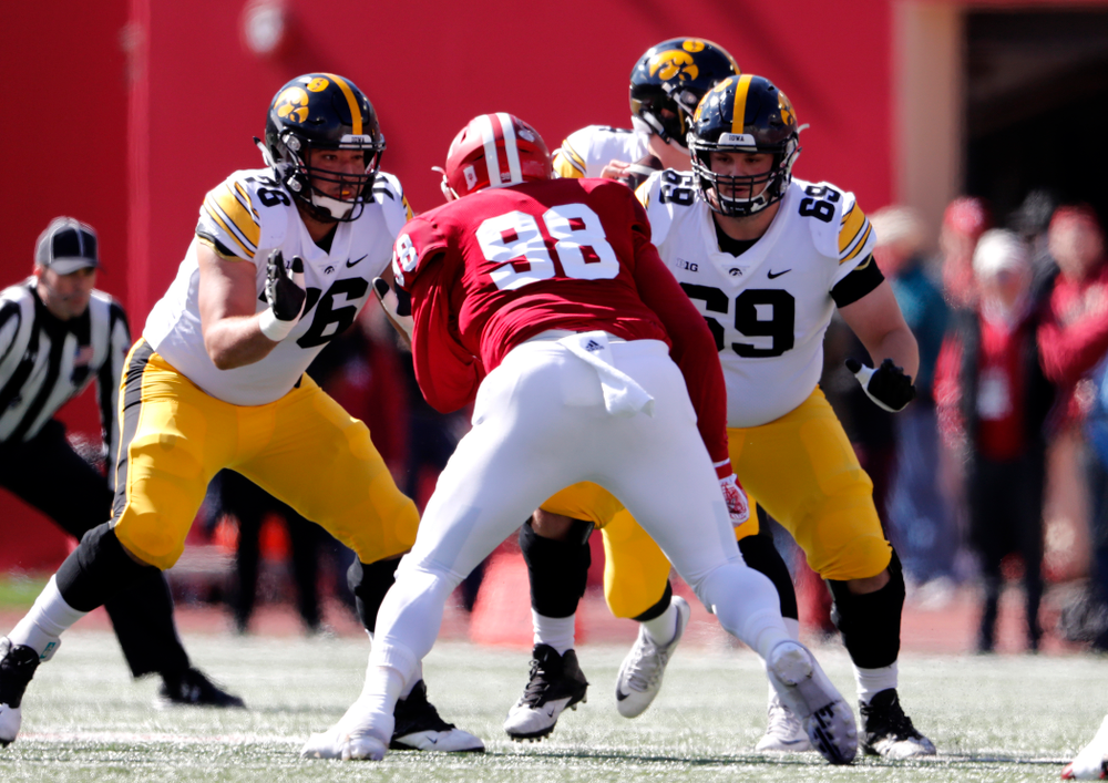 Iowa Hawkeyes offensive lineman Dalton Ferguson (76) and offensive lineman Keegan Render (69) against the Indiana Hoosiers Saturday, October 13, 2018 at Memorial Stadium, in Bloomington, Ind. (Brian Ray/hawkeyesports.com)