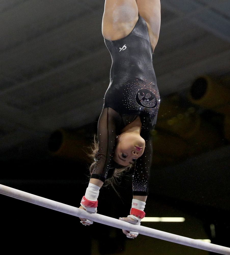 Iowa’s Clair Kaji competes on the bars against Michigan Friday, February 14, 2020 at Carver-Hawkeye Arena. (Brian Ray/hawkeyesports.com)