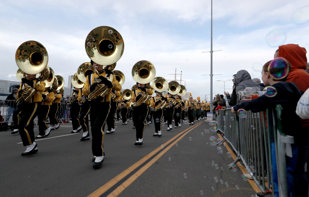 The Hawkeye Marching Band and the Iowa Spirit Squad march in the Holiday Bowl Parade Thursday, December 26, 2019 in San Diego. (Brian Ray/hawkeyesports.com)