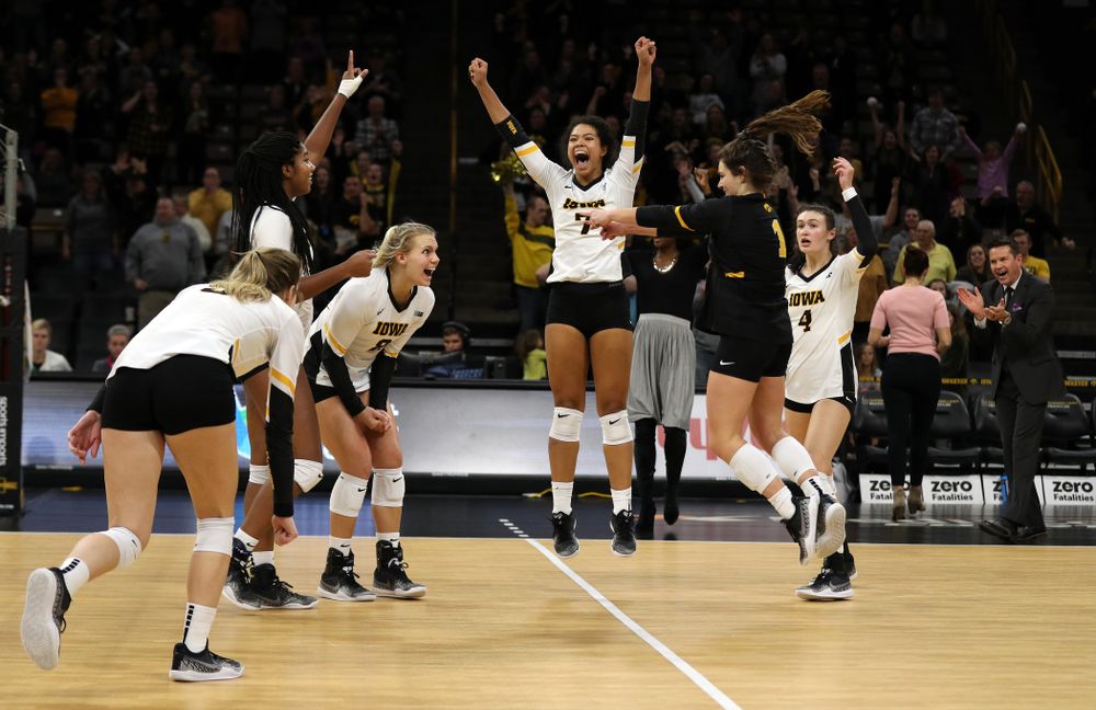The Iowa Hawkeyes celebrate match point in the 5th game against the Ohio State Buckeyes Saturday, November 24, 2018 at Carver-Hawkeye Arena. (Brian Ray/hawkeyesports.com)
