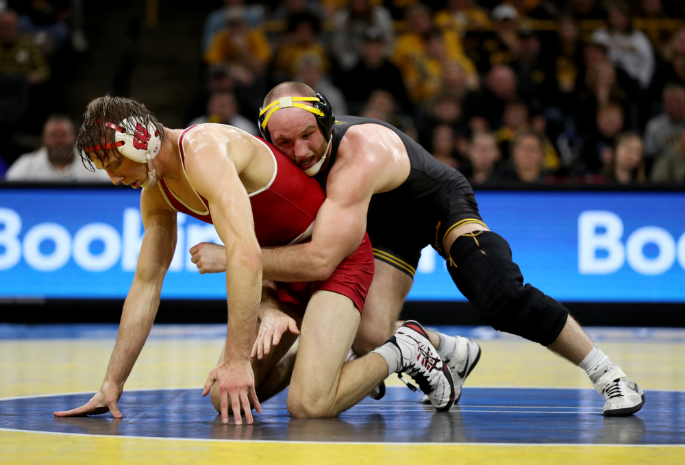 IowaÕs Alex Marinelli wrestles WisconsinÕs Evan Wick at 165 pounds Sunday, December 1, 2019 at Carver-Hawkeye Arena. Marinelli won the match 4-2. (Brian Ray/hawkeyesports.com)