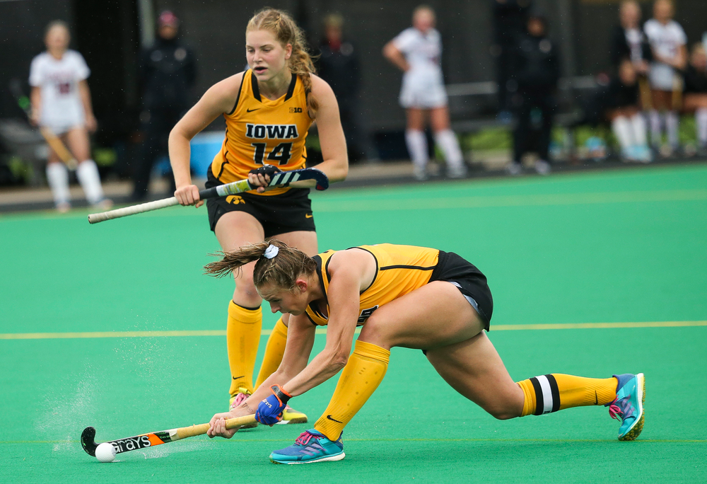 Iowa Hawkeyes midfielder Katie Birch (11) takes a shot on a penalty corner during a game against Stanford at Grant Field on October 7, 2018. (Tork Mason/hawkeyesports.com)