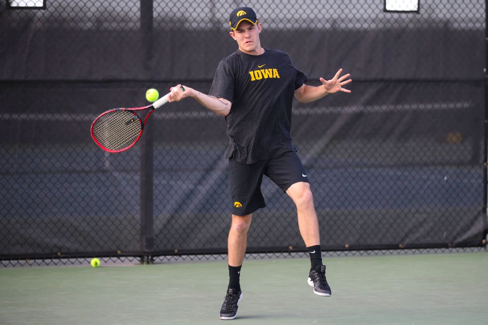 IowaÕs Jonas Larsen at tennis vs Illinois State on Sunday, April 21, 2019 at the Hawkeye Tennis and Recreation Complex. (Lily Smith/hawkeyesports.com)