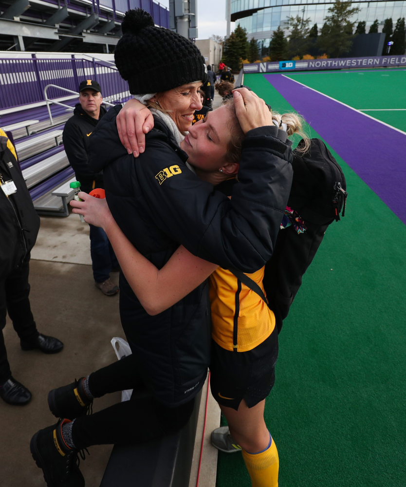 Iowa Hawkeyes Ellie Holley (7) hugs her family after their 2-1 victory over the Michigan Wolverines in the semi-finals of the Big Ten Tournament Friday, November 2, 2018 at Lakeside Field on the campus of Northwestern University in Evanston, Ill. (Brian Ray/hawkeyesports.com)