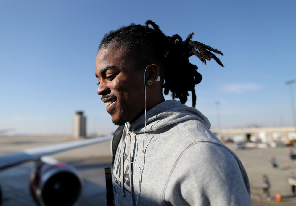 Iowa Hawkeyes defensive back Devonte Young (17) boards the team plane at the Eastern Iowa Airport Saturday, December 21, 2019 on the way to San Diego, CA for the Holiday Bowl. (Brian Ray/hawkeyesports.com)