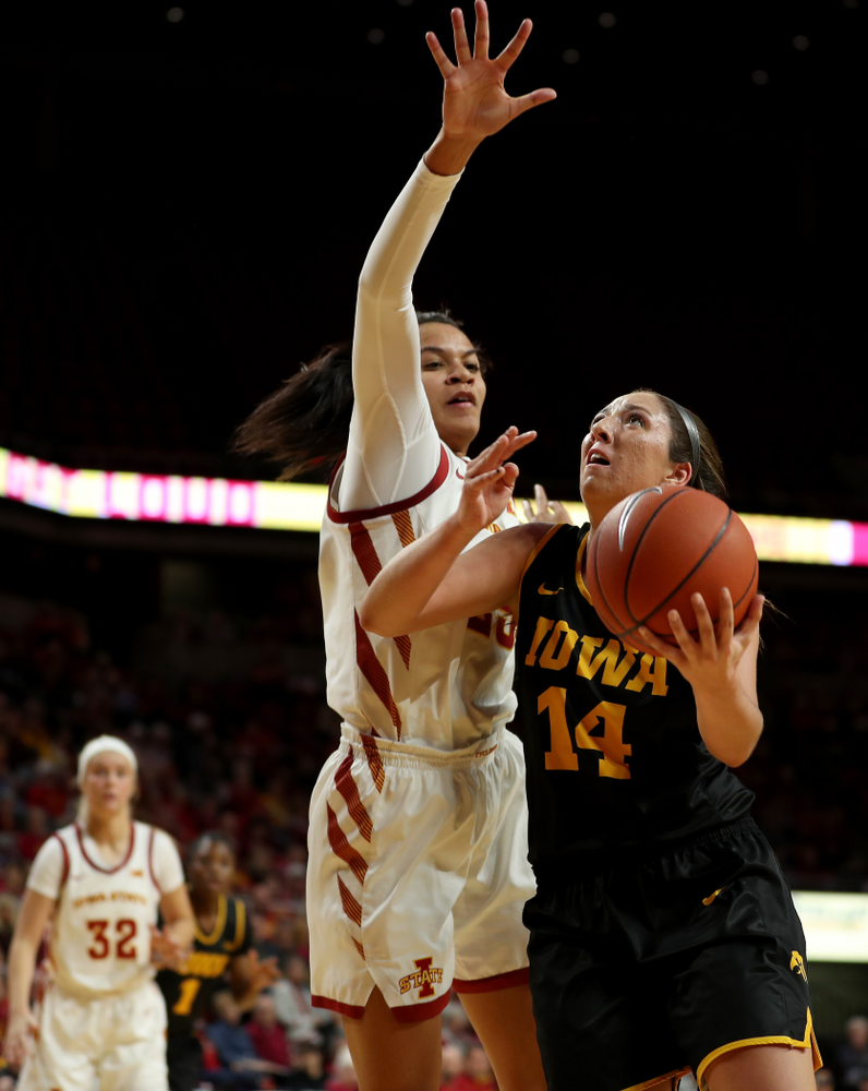 Iowa Hawkeyes forward McKenna Warnock (14) against the Iowa State Cyclones Wednesday, December 11, 2019 at Hilton Coliseum in Ames, Iowa(Brian Ray/hawkeyesports.com)