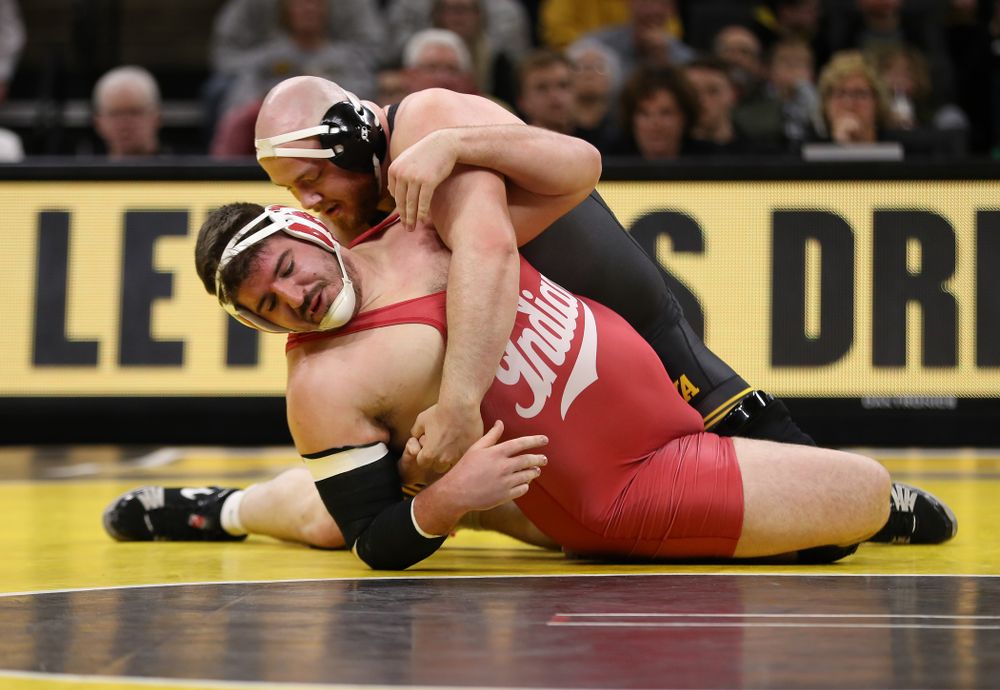 Iowa's Sam Stoll wrestles Indiana's Fletcher Miller at heavyweight Friday, February 15, 2019 at Carver-Hawkeye Arena. (Brian Ray/hawkeyesports.com)