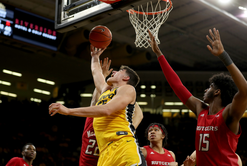Iowa Hawkeyes forward Luka Garza (55) goes to the hoop against the Rutgers Scarlet Knights Wednesday, January 22, 2020 at Carver-Hawkeye Arena. (Brian Ray/hawkeyesports.com)