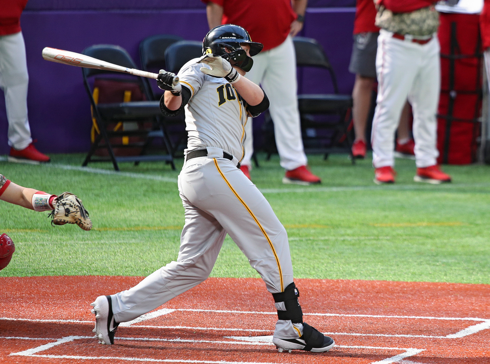 Iowa Hawkeyes outfielder Zeb Adreon (5) drives a pitch for a hit during the fifth inning of their CambriaCollegeClassic game at U.S. Bank Stadium in Minneapolis, Minn. on Friday, February 28, 2020. (Stephen Mally/hawkeyesports.com)