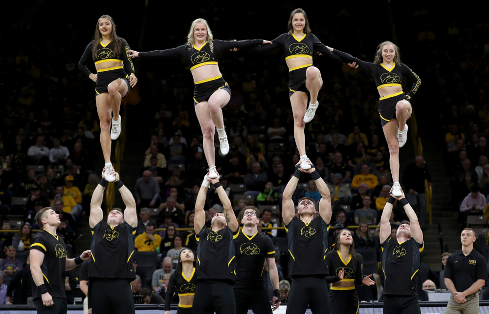 The Iowa Cheerleaders and Dance Team perform on senior night at half-time of the Iowa Hawkeyes game against the Purdue Boilermakers Tuesday, March 3, 2020 at Carver-Hawkeye Arena. (Brian Ray/hawkeyesports.com)
