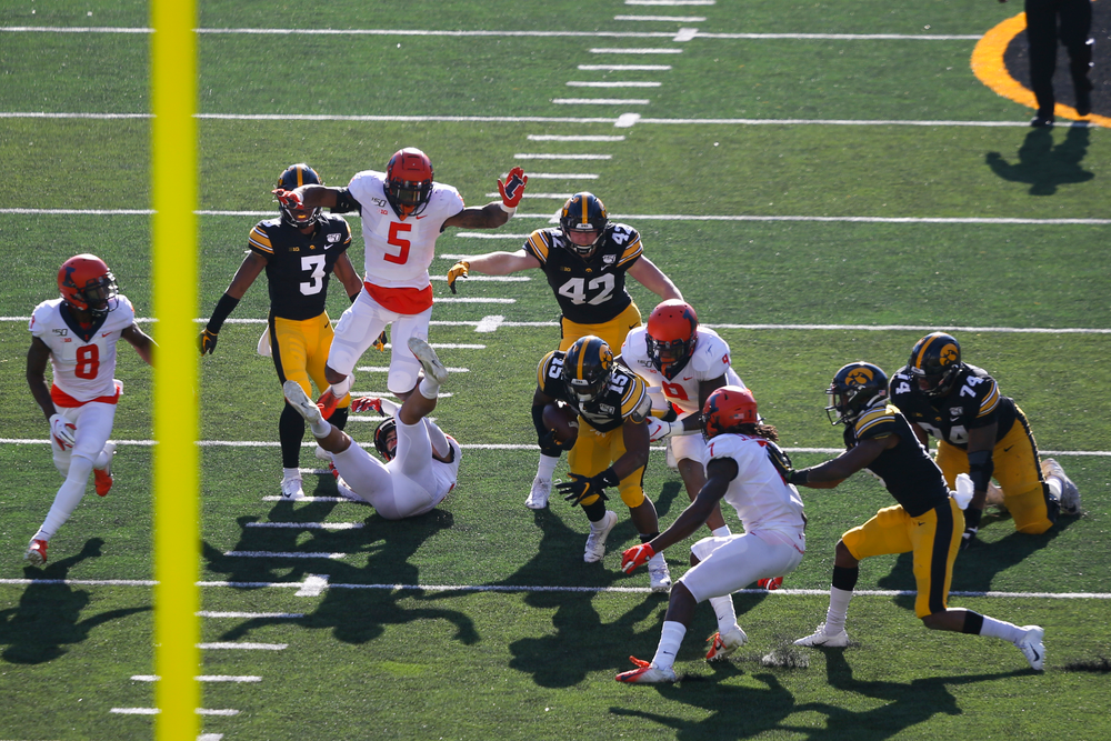 Iowa Hawkeyes running back Tyler Goodson (15), Iowa Hawkeyes tight end Shaun Beyer (42) and Iowa Hawkeyes wide receiver Tyrone Tracy Jr. (3) during Iowa football vs Illinois on Saturday, November 23, 2019 at Kinnick Stadium. (Lily Smith/hawkeyesports.com)