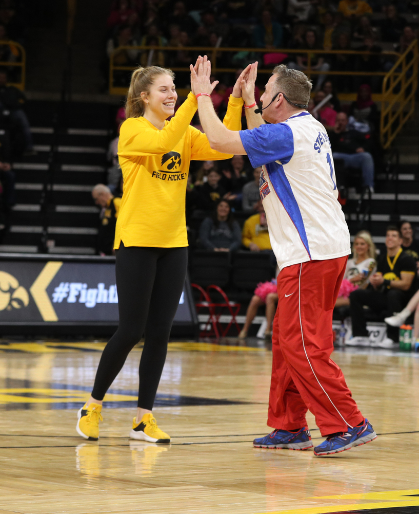 The Iowa Field Hockey Team, Soccer Team, Tennis Team, and Volleyball team play Simon Sez as they celebrate National Girls and Women in Sports day during halftime of the Iowa Hawkeyes game against the seventh ranked Maryland Terrapins Sunday, February 17, 2019 at Carver-Hawkeye Arena. (Brian Ray/hawkeyesports.com)