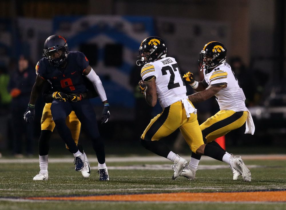 Iowa Hawkeyes defensive back Amani Hooker (27) intercepts a pass against the Illinois Fighting Illini Saturday, November 17, 2018 at Memorial Stadium in Champaign, Ill. (Brian Ray/hawkeyesports.com)
