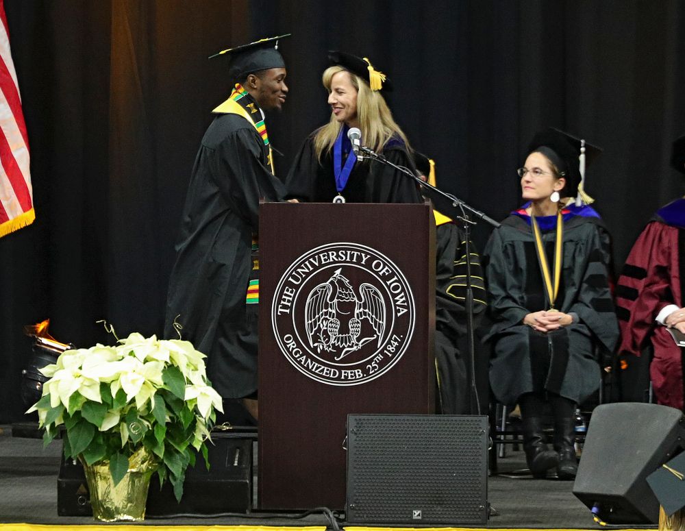 Iowa Track and Field’s Karayme Bartley during the College of Liberal Arts and Sciences and University College Fall 2019 Commencement ceremony at Carver-Hawkeye Arena in Iowa City on Saturday, December 21, 2019. (Stephen Mally/hawkeyesports.com)